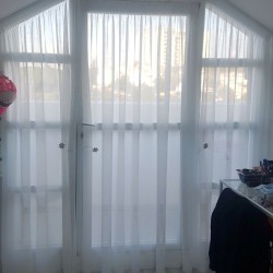 סגנונות שונים של וילונות לסלון